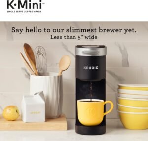Keurig K-Mini single serve coffee maker in black on small apartment kitchen counter